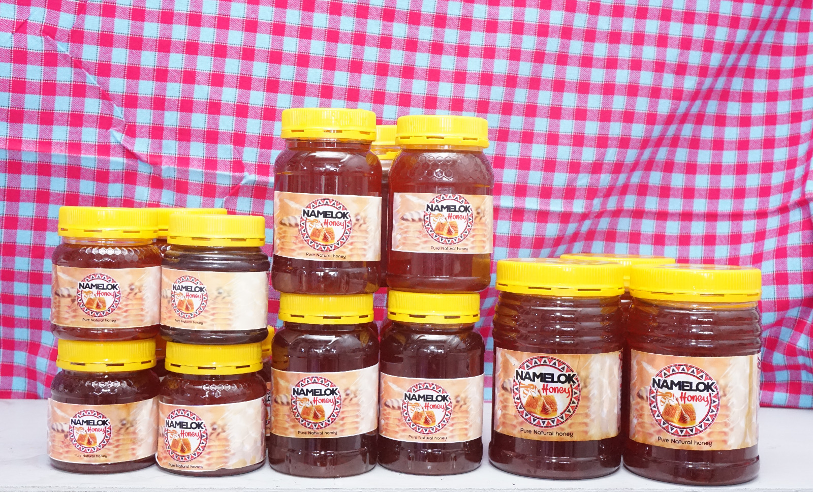Packaged Namelok honey jars